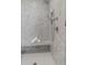 Spacious shower with marble tile and built-in bench at 310 Longshore St # 645, Daniel Island, SC 29492