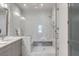 Elegant shower with marble tile and built-in bench at 310 Longshore St # 645, Daniel Island, SC 29492