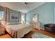 Large bedroom with hardwood floors and a ceiling fan at 359 Muirfield Pkwy, Charleston, SC 29414