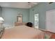 Spacious bedroom with ensuite bathroom and hardwood floors at 359 Muirfield Pkwy, Charleston, SC 29414