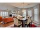 Sunlit dining area with hardwood floors and access to backyard at 359 Muirfield Pkwy, Charleston, SC 29414
