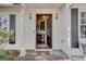 Inviting entryway with a wooden door and a small console table at 359 Muirfield Pkwy, Charleston, SC 29414