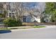 Street view of a neighborhood with houses and lush greenery at 359 Muirfield Pkwy, Charleston, SC 29414