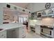 Kitchen with stainless steel appliances and built-in desk area at 359 Muirfield Pkwy, Charleston, SC 29414