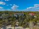 Coastal home nestled amongst palm trees with a beautiful beach setting at 367 Pelican Flight Dr, Dewees Island, SC 29451