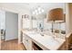 Clean bathroom with double vanity and ample counter space at 367 Pelican Flight Dr, Dewees Island, SC 29451