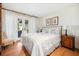 Comfortable bedroom with private access to the balcony at 367 Pelican Flight Dr, Dewees Island, SC 29451
