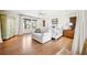 Bright bedroom with hardwood floors and ocean views at 367 Pelican Flight Dr, Dewees Island, SC 29451
