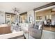 Bright and airy indoor porch with access to the home's interior at 367 Pelican Flight Dr, Dewees Island, SC 29451