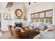 Relaxing living room with fireplace and high ceilings at 367 Pelican Flight Dr, Dewees Island, SC 29451