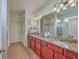 Double vanity bathroom with granite countertops at 369 Waterlily Way, Summerville, SC 29486