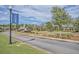 Community entrance with signage and landscaping at 369 Waterlily Way, Summerville, SC 29486