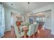 Bright dining room with hardwood floors and chandelier at 369 Waterlily Way, Summerville, SC 29486