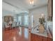 Open dining room with hardwood floors and chandelier at 369 Waterlily Way, Summerville, SC 29486