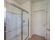 Clean shower with glass enclosure and shelving at 369 Waterlily Way, Summerville, SC 29486