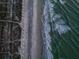 High-angle view of beach and dune landscape with boardwalk at 403 W West Ashley Ave, Folly Beach, SC 29439