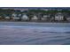 Beachfront homes with ocean view at sunset at 403 W West Ashley Ave, Folly Beach, SC 29439