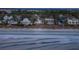 Beachfront homes and ocean waves at dusk at 403 W West Ashley Ave, Folly Beach, SC 29439