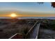 Wooden walkway to the beach at sunrise at 403 W West Ashley Ave, Folly Beach, SC 29439
