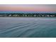 Row of beach houses with ocean view at sunset at 403 W West Ashley Ave, Folly Beach, SC 29439