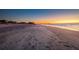 Footprints in the sand at sunrise on a beautiful beach at 403 W West Ashley Ave, Folly Beach, SC 29439