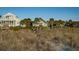 Two charming beach houses with dune landscape at 403 W West Ashley Ave, Folly Beach, SC 29439
