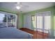 Bedroom with king-size bed and ocean access at 403 W West Ashley Ave, Folly Beach, SC 29439