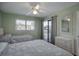 Bedroom with two twin beds and sliding glass door to balcony at 403 W West Ashley Ave, Folly Beach, SC 29439