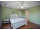 Bedroom with a full-size bed and light walls at 403 W West Ashley Ave, Folly Beach, SC 29439