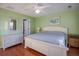 Bright bedroom with a king-size bed and ocean view at 403 W West Ashley Ave, Folly Beach, SC 29439