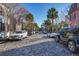 Charming street with parked cars and historic architecture at 403 W West Ashley Ave, Folly Beach, SC 29439