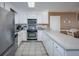 Modern kitchen with stainless steel appliances and white cabinetry at 403 W West Ashley Ave, Folly Beach, SC 29439