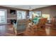 Relaxing living room with wicker furniture and hardwood floors at 403 W West Ashley Ave, Folly Beach, SC 29439