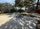 Backyard with patio, shed, and mature trees at 4765 S Constellation Dr, North Charleston, SC 29418