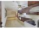 Kitchen offers dark wood cabinets and a view into the dining area at 4765 S Constellation Dr, North Charleston, SC 29418