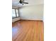 Spacious living room featuring hardwood floors and large windows at 4765 S Constellation Dr, North Charleston, SC 29418