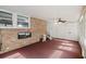 Sunroom with brick walls, carpet flooring, and a ceiling fan at 4765 S Constellation Dr, North Charleston, SC 29418