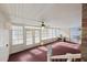Bright sunroom features a ceiling fan and access to the backyard at 4765 S Constellation Dr, North Charleston, SC 29418