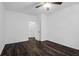 Spacious bedroom with dark flooring and access to hallway at 500 Bucksley Ln # 205, Charleston, SC 29492