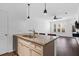 Kitchen island with granite countertop, stainless steel sink, and pendant lighting at 500 Bucksley Ln # 205, Charleston, SC 29492