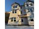 New construction home exterior; three-story building with snow on the ground at 5112 Double Eagle, Summerville, SC 29485