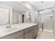 Primary bathroom with double vanity and a large walk-in shower at 558 Richfield Way, Summerville, SC 29486