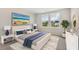 Bright bedroom with a queen-size bed and backyard view at 558 Richfield Way, Summerville, SC 29486