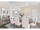 Elegant dining room with a large table and six chairs at 558 Richfield Way, Summerville, SC 29486