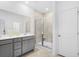 Bathroom with double vanity and walk-in shower at 563 Richfield Way, Summerville, SC 29486