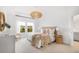 Main bedroom with large windows and neutral decor at 563 Richfield Way, Summerville, SC 29486
