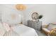 Guest bedroom with dresser and wicker chair at 563 Richfield Way, Summerville, SC 29486