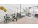 Playroom with hanging bed, game table, and seating at 563 Richfield Way, Summerville, SC 29486