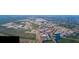 Aerial view of a large community with houses, lakes, and schools at 566 Richfield Way, Summerville, SC 29486
