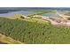 Aerial view of expansive lake and surrounding forest at 566 Richfield Way, Summerville, SC 29486